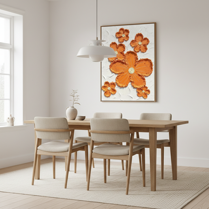 Orange sculptural flower scatter oil painting in a Scandinavian dining room